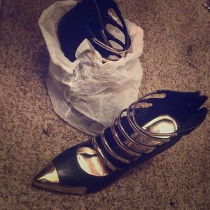 Black and gold heels